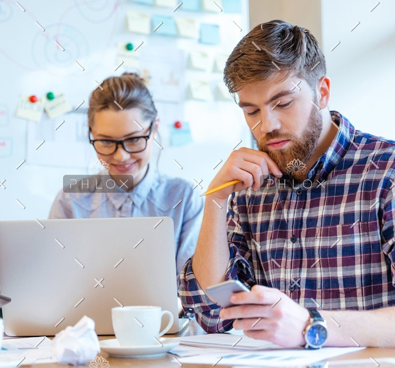 demo-attachment-312-people-working-in-office-P3DBYE3